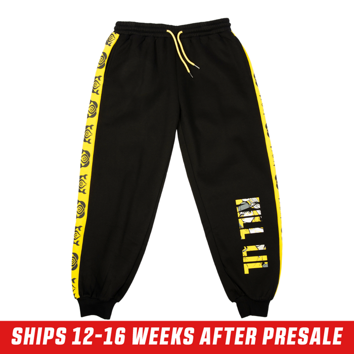 Black sweatpants with bold yellow "KILL LIL" text featuring an anime character graphic inside the letters.